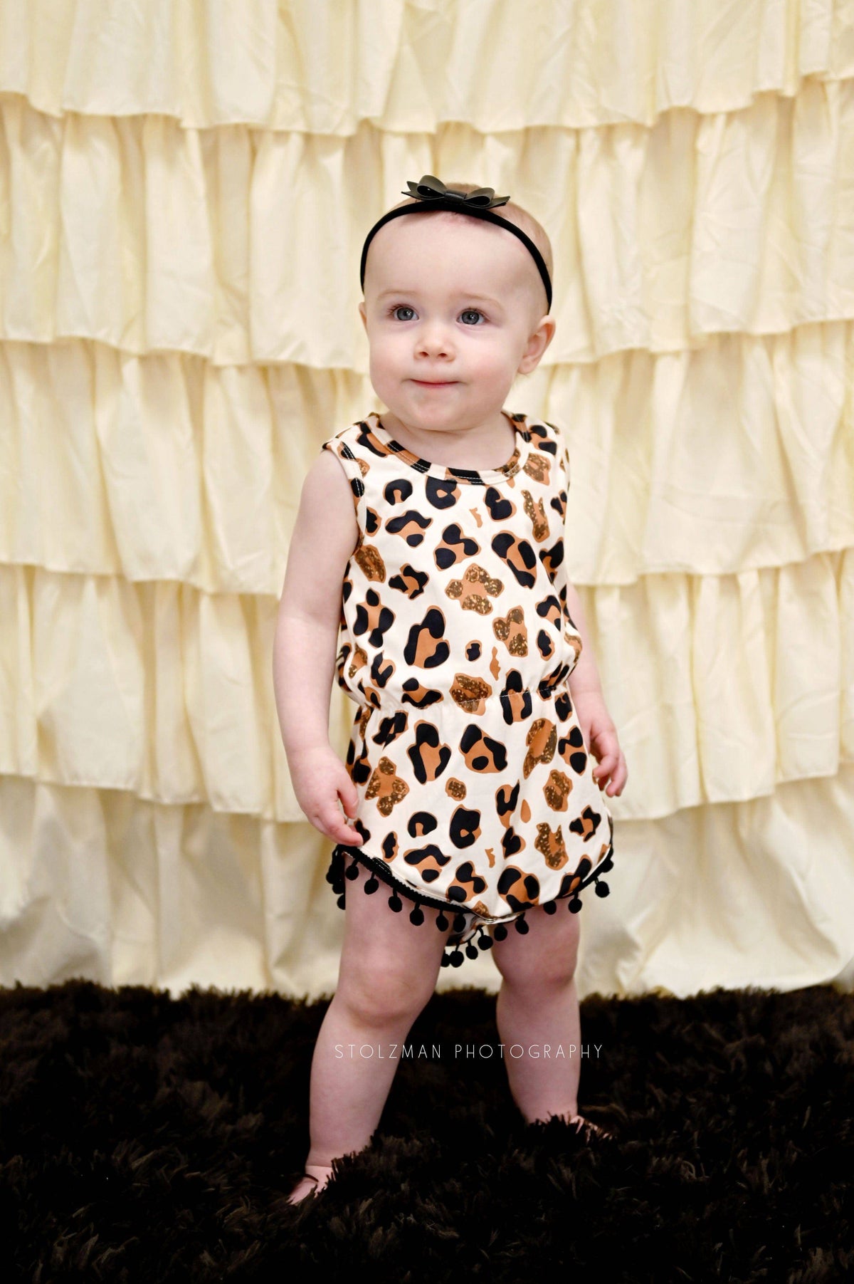 Cheetah Print Milk Silk Pom Pom Romper - Great Lakes Kids Apparel LLC