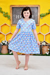 All The Buzz Short Sleeve Milk Silk Dress - Great Lakes Kids Apparel LLC